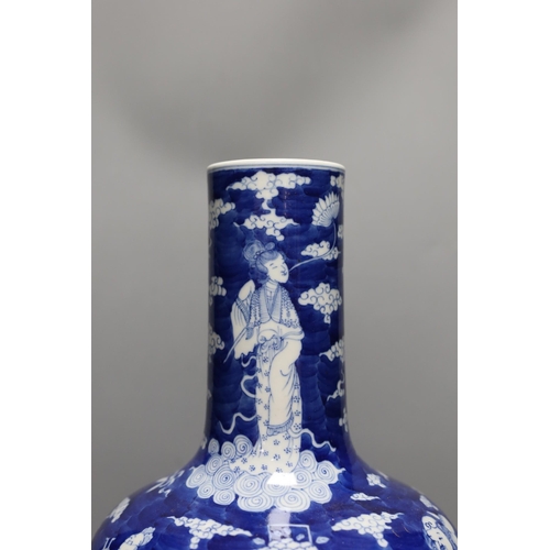 440 - A Chinese blue and white figural vase on hardwood stand, 40cm total height