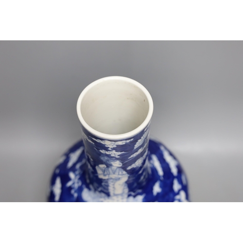 440 - A Chinese blue and white figural vase on hardwood stand, 40cm total height