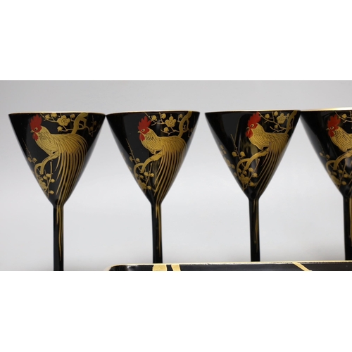 454 - A set of six Japanese lacquer cocktail or liqueur cups and a similar tray