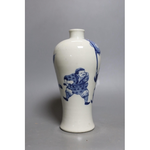 455 - A Chinese blue and white baluster warrior vase. 22cm tall