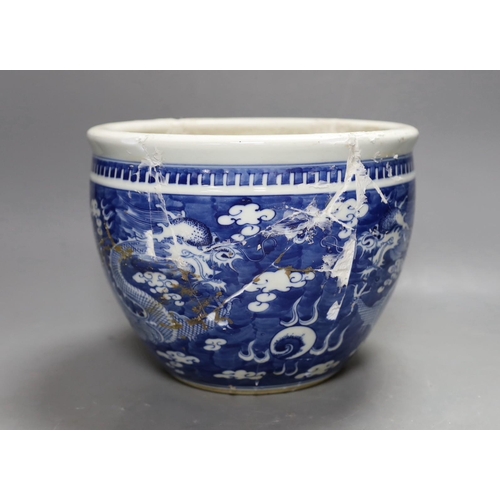 459 - A Chinese blue and white dragon jardiniere, 24 cm diameter