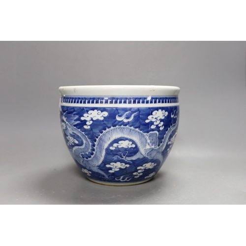 459 - A Chinese blue and white dragon jardiniere, 24 cm diameter