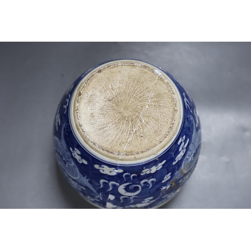 459 - A Chinese blue and white dragon jardiniere, 24 cm diameter