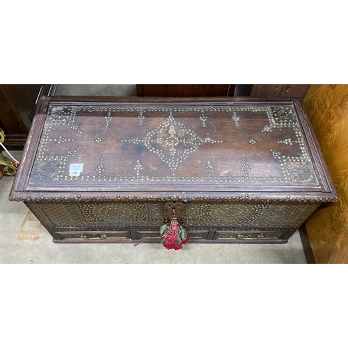 46 - A studded Moroccan coffer, length 100cm, depth 45cm, height 45cm