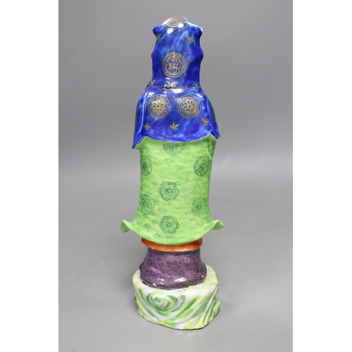 467 - A Chinese enamelled porcelain figure of Guanyin, Jiaqing - Daoguang period, damage, 34cms high,... 