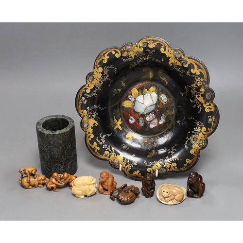 468 - A Chinese soapstone brush pot and a group of netsuke and a papier mache dish, 26cms diameter,