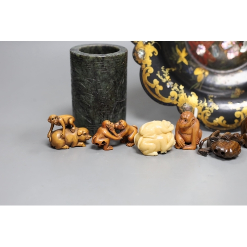 468 - A Chinese soapstone brush pot and a group of netsuke and a papier mache dish, 26cms diameter,