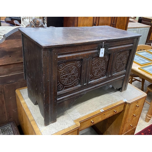 47 - A late 17th / early 18th century panelled carved oak coffer, length 101cm, depth 49cm, height 64cm... 