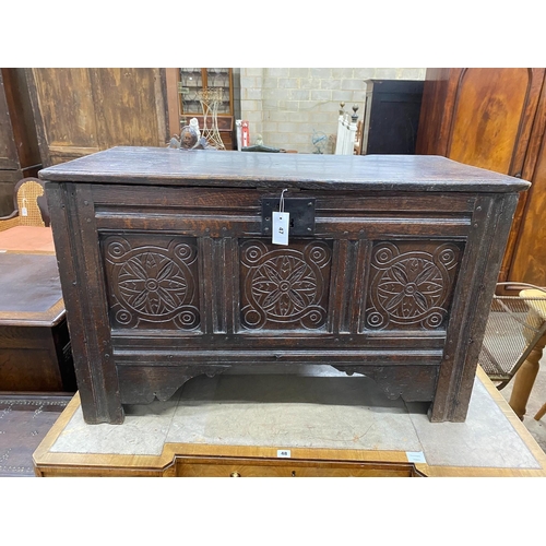 47 - A late 17th / early 18th century panelled carved oak coffer, length 101cm, depth 49cm, height 64cm... 