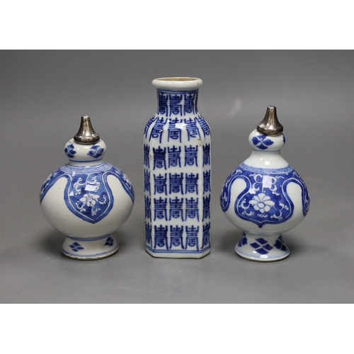 477 - A pair of Chinese Kangxi blue and white rose water sprinklers (cut down) and an unusual 19th century... 