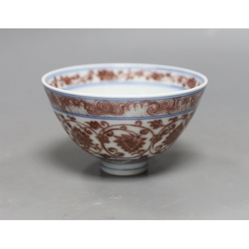 482 - A small Chinese underglaze copper red bowl, 7.5cms high