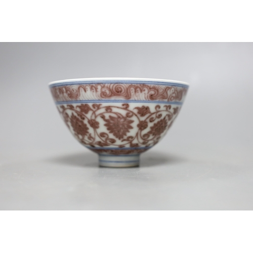 482 - A small Chinese underglaze copper red bowl, 7.5cms high