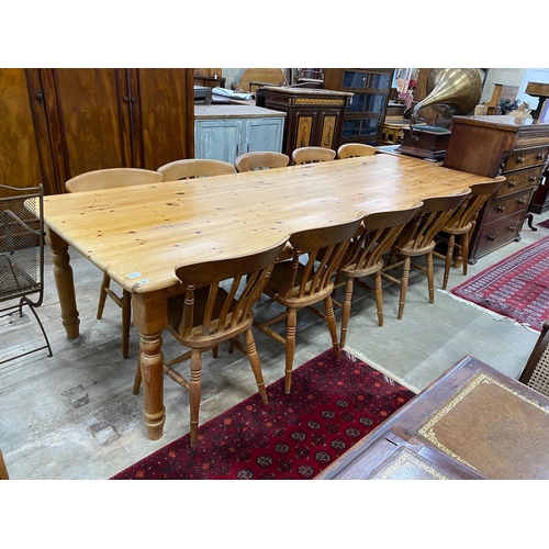 49 - A large Victorian style rectangular pine kitchen table, length 305cm, depth 105cm, height 76cm and t... 