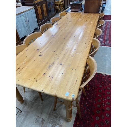 49 - A large Victorian style rectangular pine kitchen table, length 305cm, depth 105cm, height 76cm and t... 