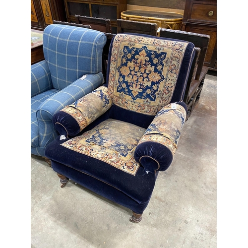 58 - A Victorian saddlebag upholstered armchair, width 85cm, depth 92cm, height 97cm