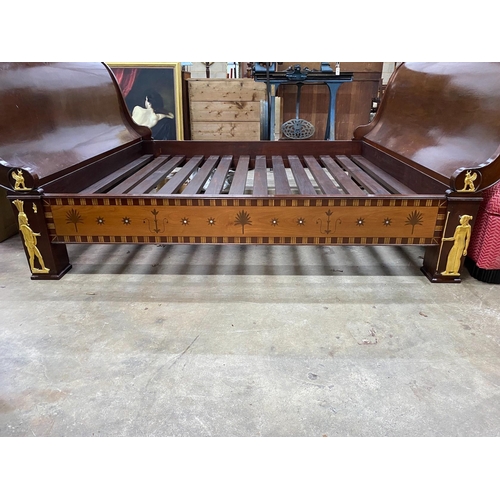 59 - A reproduction Egyptian style inlaid gilt metal mounted mahogany sleigh bedframe, width 193cm, lengt... 