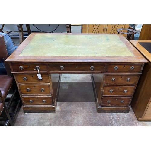 64 - A small Victorian mahogany pedestal partner's desk, length 137cm, depth 90cm, height 76cm