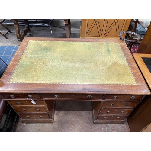 64 - A small Victorian mahogany pedestal partner's desk, length 137cm, depth 90cm, height 76cm