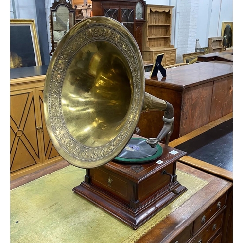 66 - An early 20th century Apollo mahogany gramophone with brass horn, height 86cm