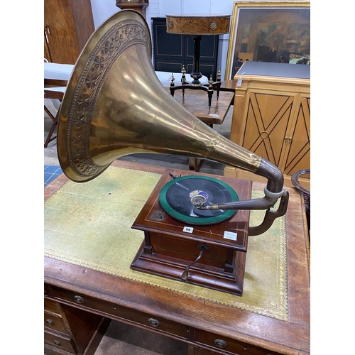 66 - An early 20th century Apollo mahogany gramophone with brass horn, height 86cm