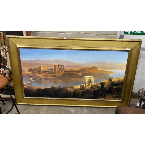 71 - A large oil on canvas, Egyptian landscape, canvas width 152cm, height 76cm