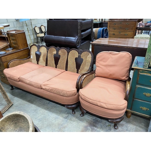 75 - A 1920's caned beech two piece bergere suite, settee length 168cm, depth 72cm, height 82cm