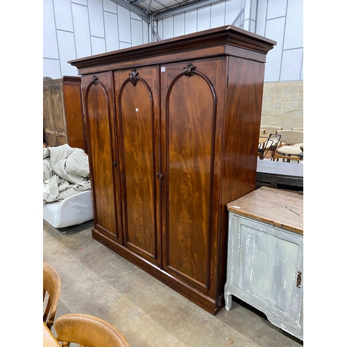 77 - A Victorian mahogany compactum wardrobe, length 199cm, depth 65cm, height 208cm