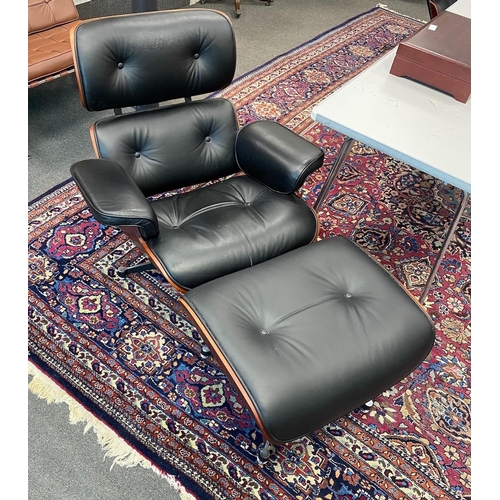 91 - A pair of Eames style black leather, simulated rosewood swivel lounge chairs and footstools