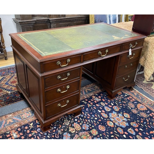 94 - A George III style mahogany pedestal desk, width 140cm, depth 78cm, height 80cm