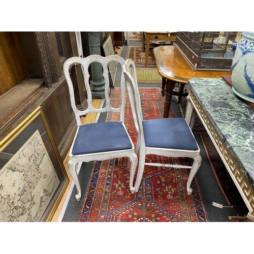 95 - A set of four early 20th century Hepplewhite style painted dining chairs