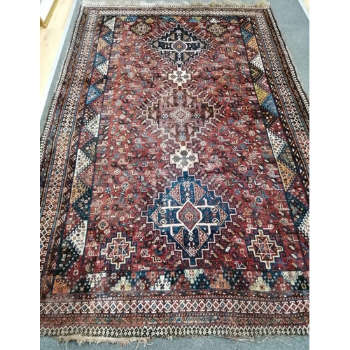 96 - A North West Persian red ground rug, a Tabriz blue ground rug and two smaller modern rugs, largest 2... 