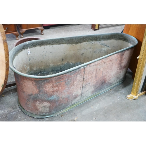 1001 - A 19th century copper bath of tapering form, length 162cm, depth 68cm, height 63cm