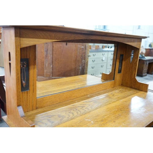 1002 - An Art Nouveau oak mirror back sideboard, length 122cm, depth 55cm, height 145cm