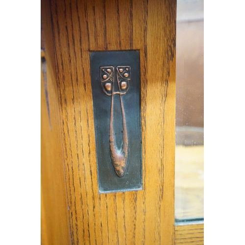 1002 - An Art Nouveau oak mirror back sideboard, length 122cm, depth 55cm, height 145cm