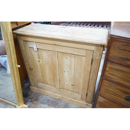 1003 - A Victorian panelled pine single door side cabinet, width 96cm, depth 35cm, height 94cm