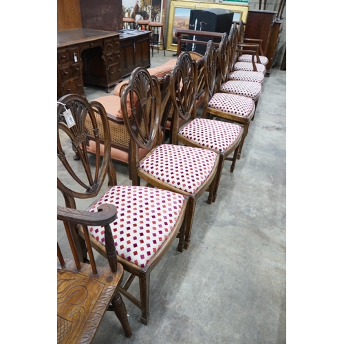 1011 - A set of eight Hepplewhite style mahogany dining chairs, two with arms