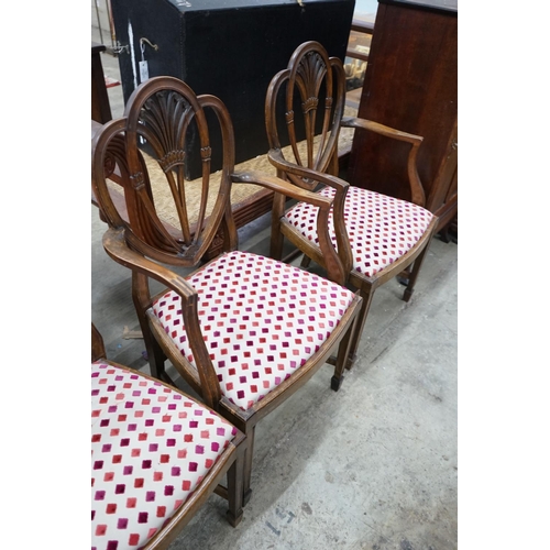 1011 - A set of eight Hepplewhite style mahogany dining chairs, two with arms