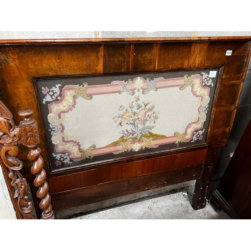 1016 - A Victorian rectangular walnut framed headboard with a floral tapestry panel, height 113cm