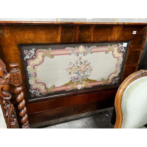 1016 - A Victorian rectangular walnut framed headboard with a floral tapestry panel, height 113cm