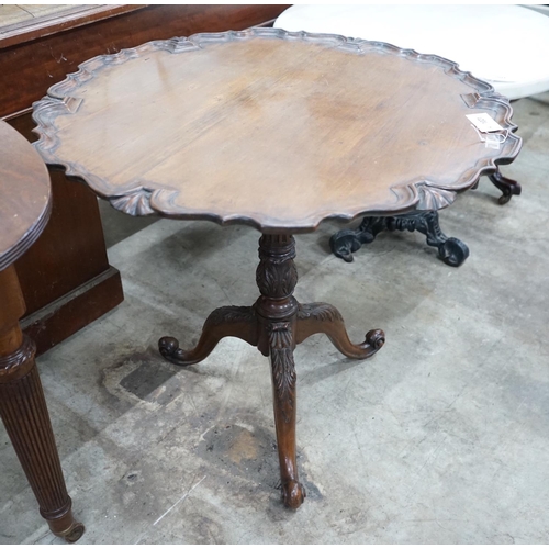 1021 - A George III style circular mahogany tilt top tripod tea table, diameter 81cm, height 74cm