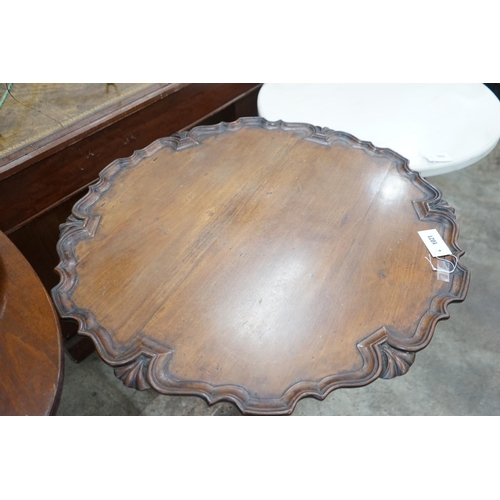 1021 - A George III style circular mahogany tilt top tripod tea table, diameter 81cm, height 74cm