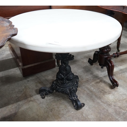 1022 - A Victorian style circular cast iron and reconstituted marble top occasional table, diameter 75cm, h... 