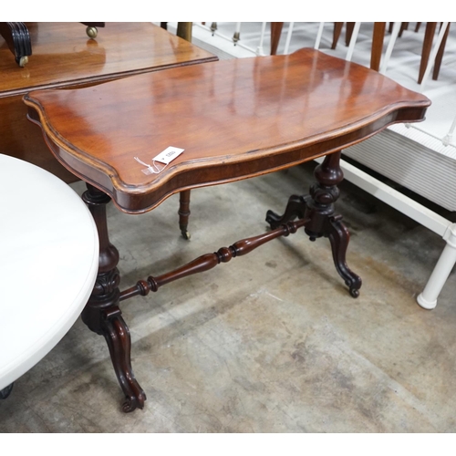 1023 - A Victorian mahogany stretcher table, length 106cm, depth 52cm, height 75cm