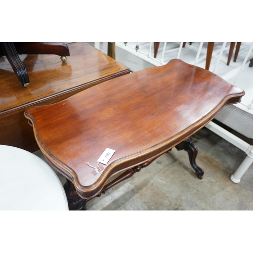 1023 - A Victorian mahogany stretcher table, length 106cm, depth 52cm, height 75cm