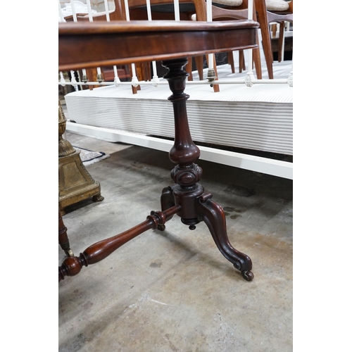 1023 - A Victorian mahogany stretcher table, length 106cm, depth 52cm, height 75cm