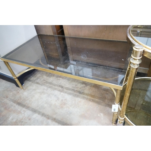 1034 - A brass and smoked glass rectangular coffee table, width 99cm, depth 51cm, height 42cm