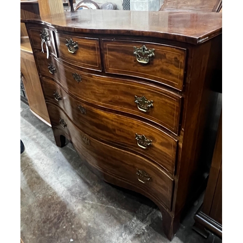 1043 - A George III serpentine mahogany chest of drawers, width 115cm, depth 55cm, height 104cm