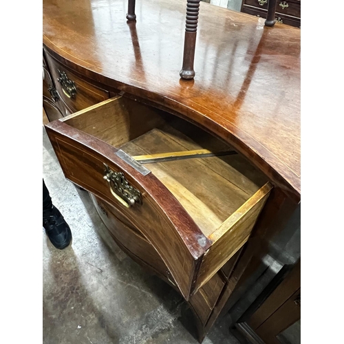 1043 - A George III serpentine mahogany chest of drawers, width 115cm, depth 55cm, height 104cm