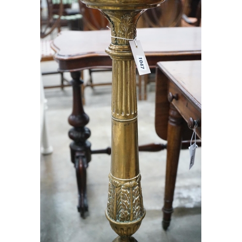 1047 - An 18th century style brass standard lamp, height 99cm