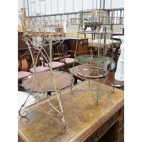 1050 - Two Victorian painted wirework pot stands, larger height 90cm